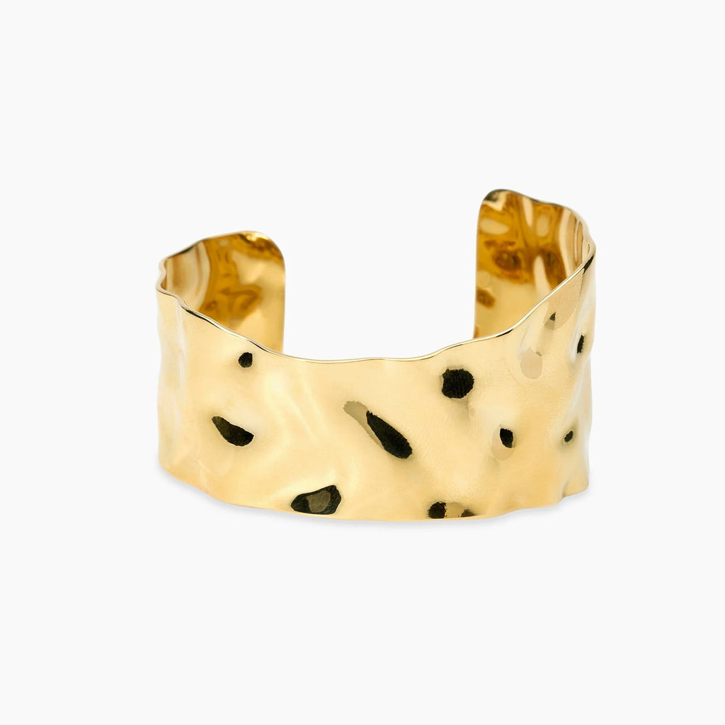 Bracciale Bangle aperto in acciaio dorato martellato