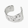 Bracciale Bangle aperto in acciaio martellato