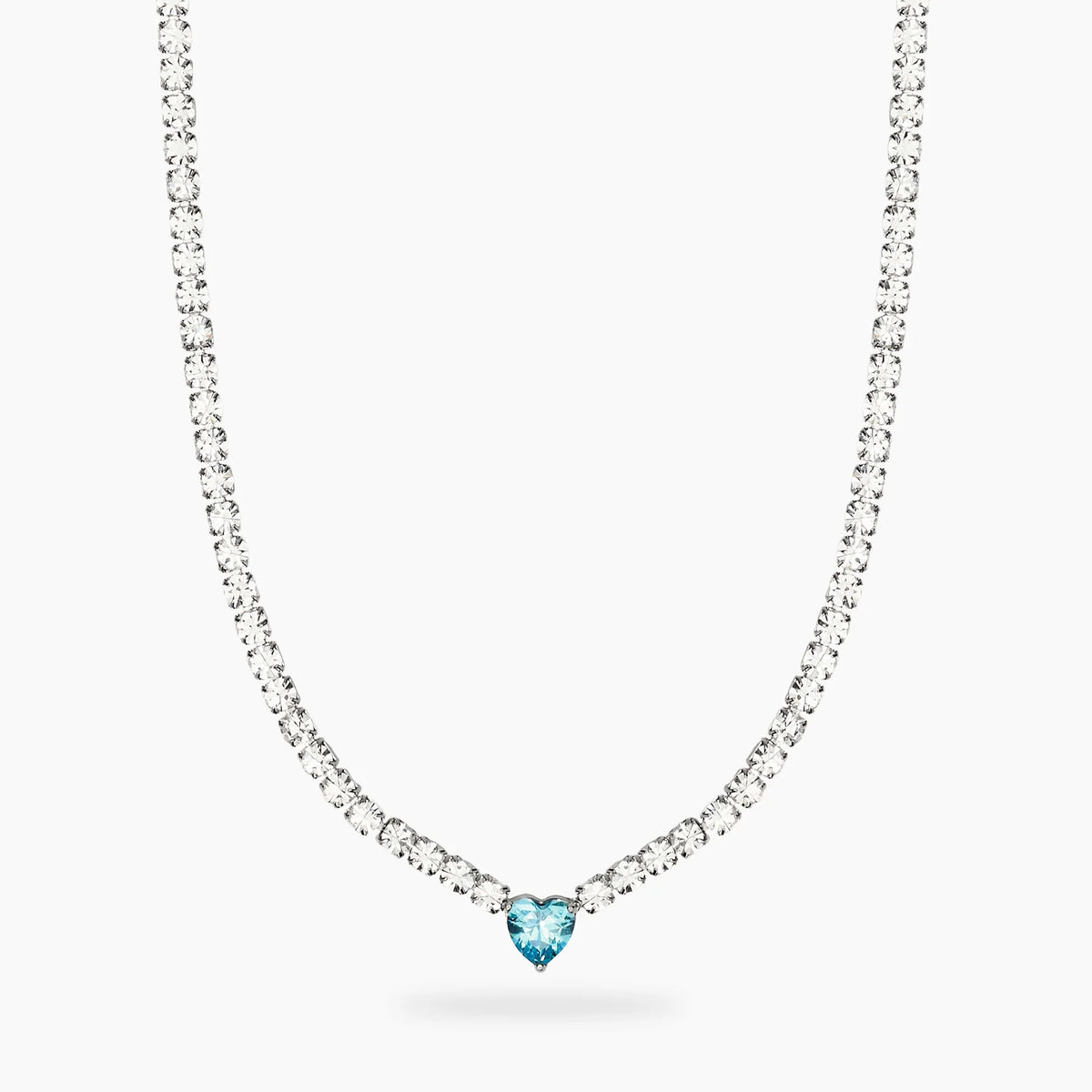 STYLE COLLECTION | STYLE 102  Girocollo tennis con cristalli e cuore azzurro in zircone