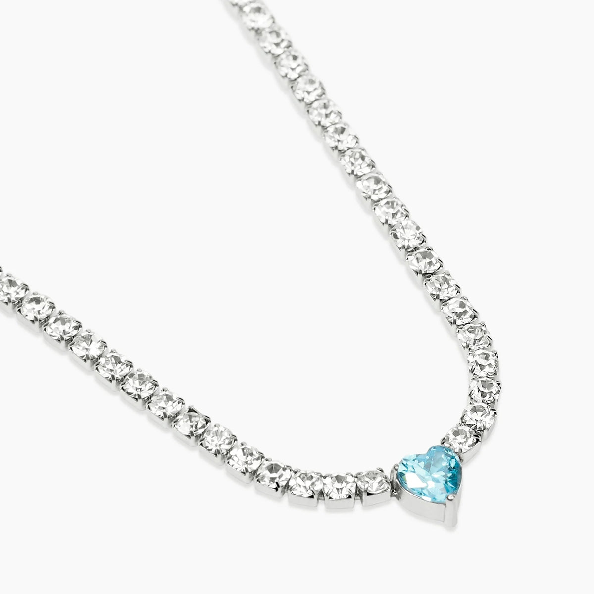 STYLE COLLECTION | STYLE 102  Girocollo tennis con cristalli e cuore azzurro in zircone