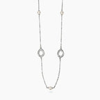 STYLE COLLECTION | STYLE 92  Collana in acciaio con catena rolò, elementi goccia e perle conchiglia
