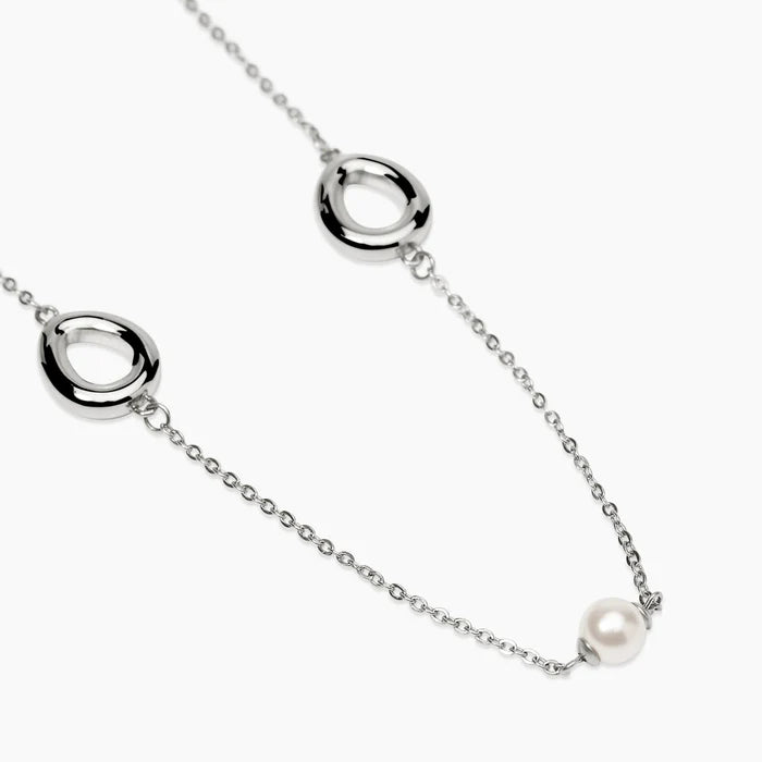 STYLE COLLECTION | STYLE 92  Collana in acciaio con catena rolò, elementi goccia e perle conchiglia