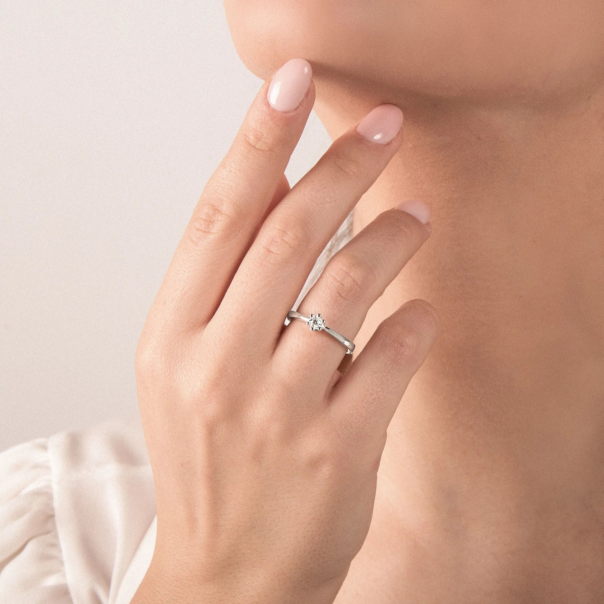 Anello Solitario oro Bianco e Diamanti ct.0.16 - ANELLI