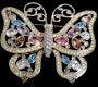 Grande spilla a farfalla placcata in oro firmata Swarovski con castone incastonato di cristalli
