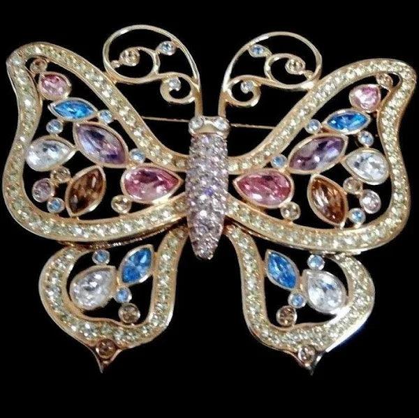 Grande spilla a farfalla placcata in oro firmata Swarovski con castone incastonato di cristalli