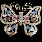 Grande spilla a farfalla placcata in oro firmata Swarovski con castone incastonato di cristalli